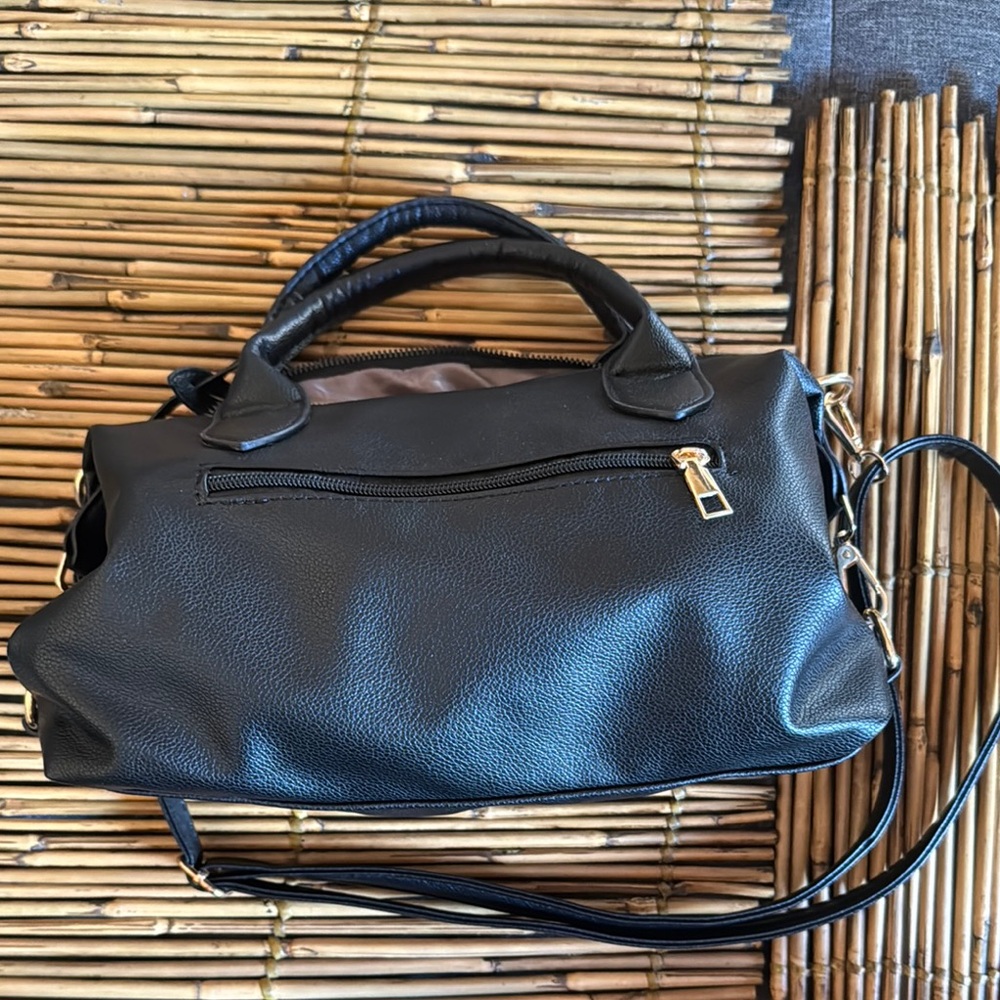 Black Leather Satchel with Sturdy Handles and Zipper Closure